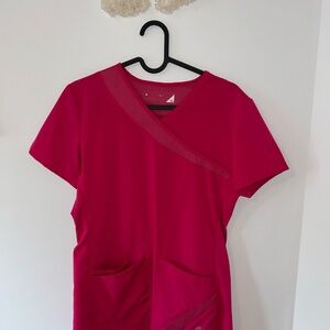 Pink two-pocket scrub top